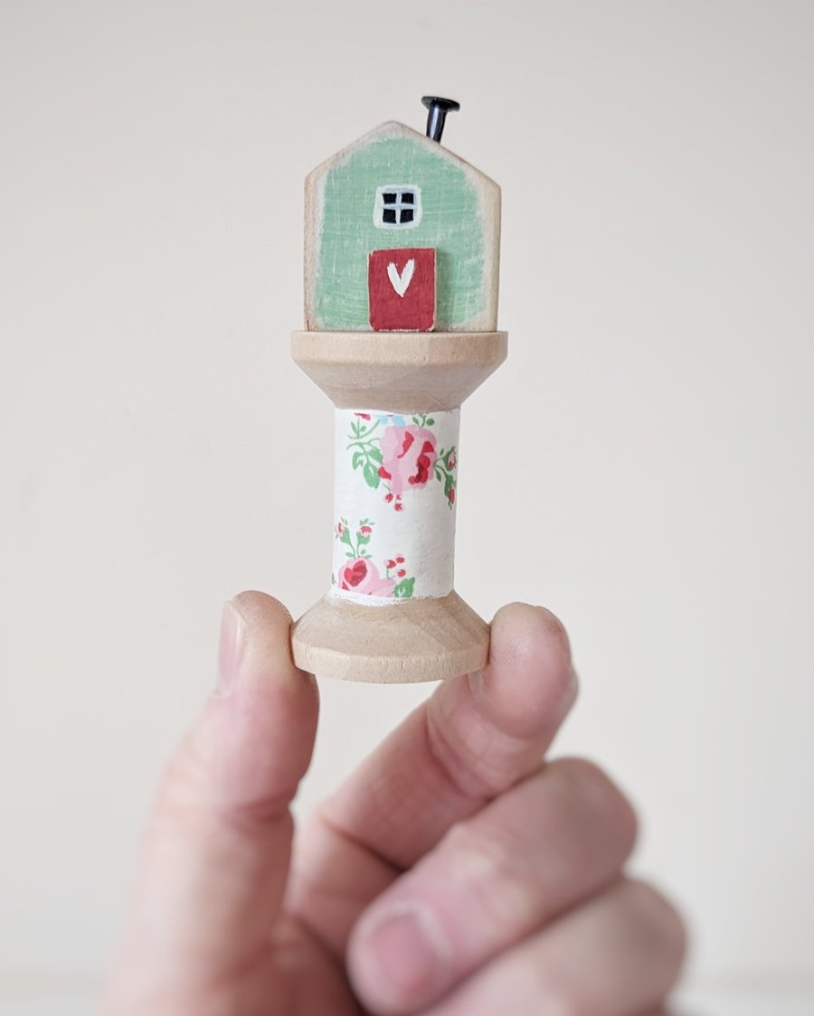 Little Wooden House on a Floral Wooden Bobbin 