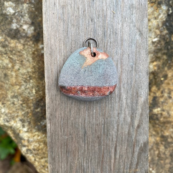 Stone pendant with copper, 538