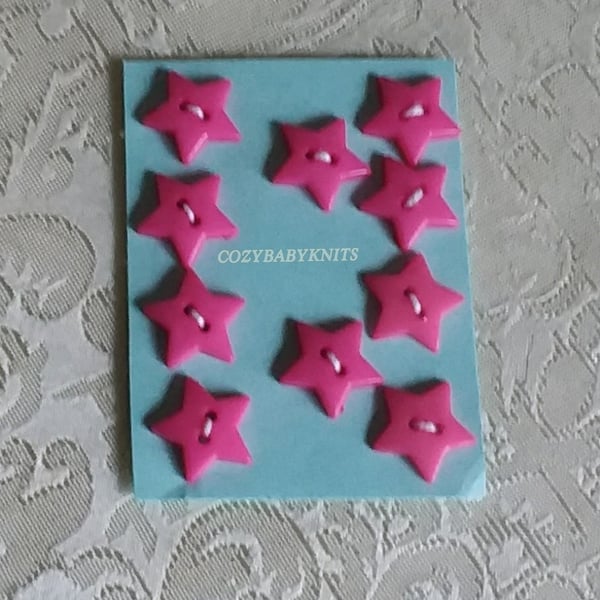 Bright pink star plastic buttons