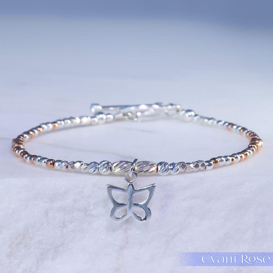 Butterfly sterling silver and rose gold unique bracelet 