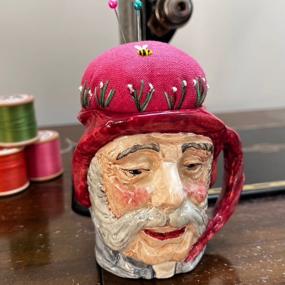 Pin cushion in repurposed vintage Toby jug embroidered flowers and bee