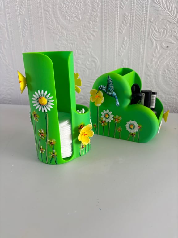 A hand painted and sealed cosmetic storage set by Andrew Jenkins