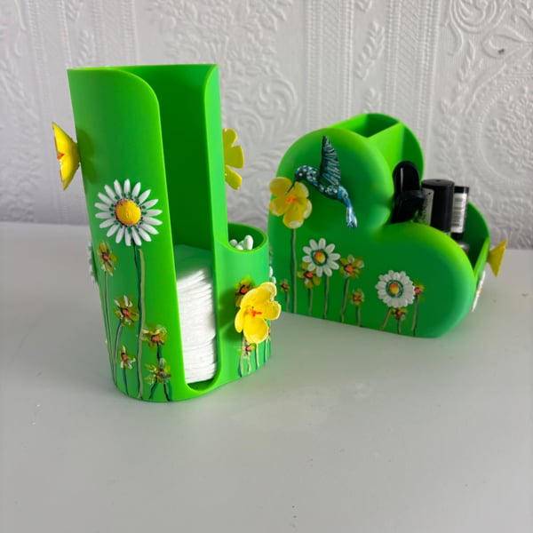 A hand painted and sealed cosmetic storage set by Andrew Jenkins