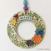 Ceramic floral wreath decoration with bird and flowers pottery bird Create