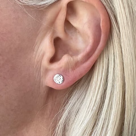 Round stud earrings, hammered silver