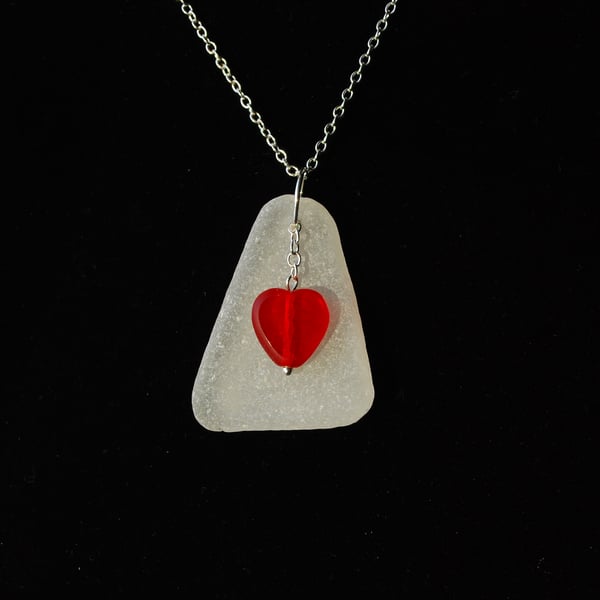 White sea glass pendant with red heart