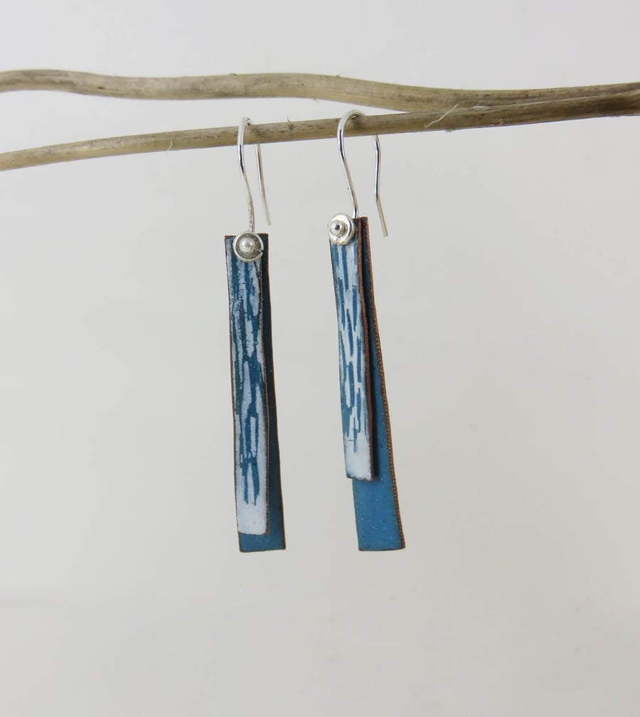 Turquoise and white dangle earrings in two parts with hand drawn detail