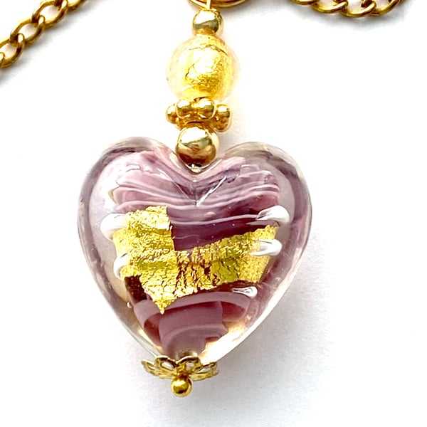 Murano Glass gold and purple Murano Glass heart pendant with gold chain.
