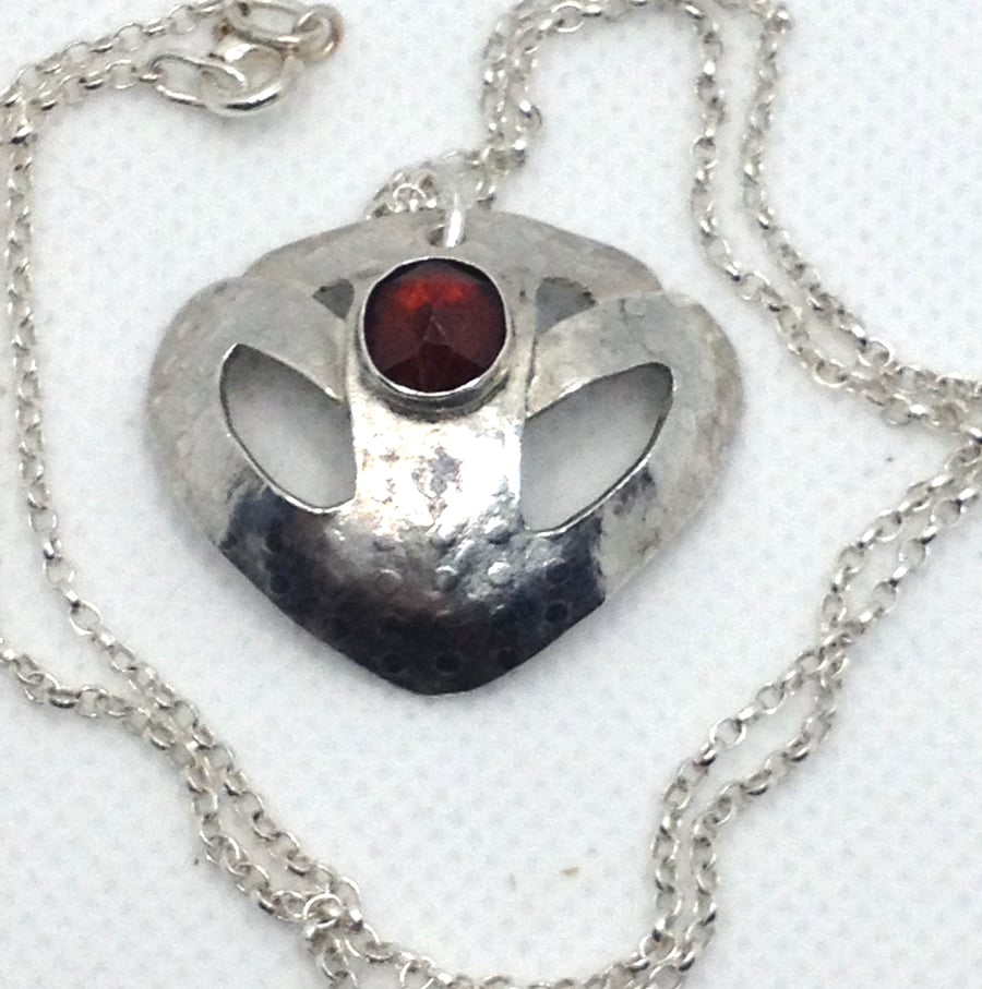 Silver and Gsrnet domed pendant