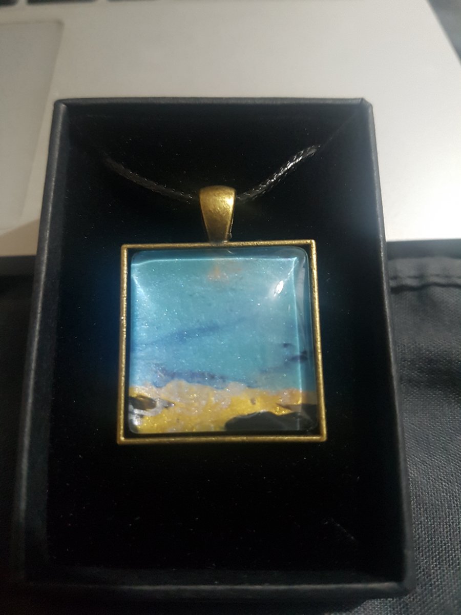 Blue and gold pendant 
