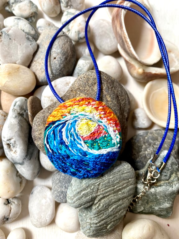 Rolling wave at sunset, hand embroidered pendant 
