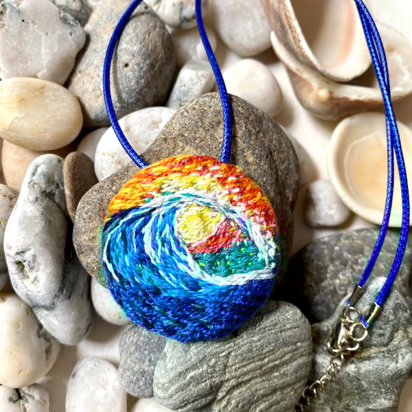 Rolling wave at sunset, hand embroidered pendant 