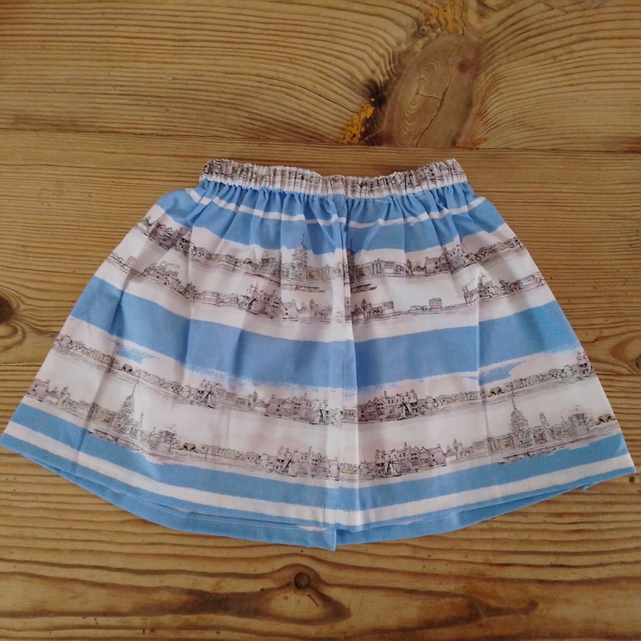 Baby or toddler skirt in a blue stripe cityscape pattern 12-18 months.