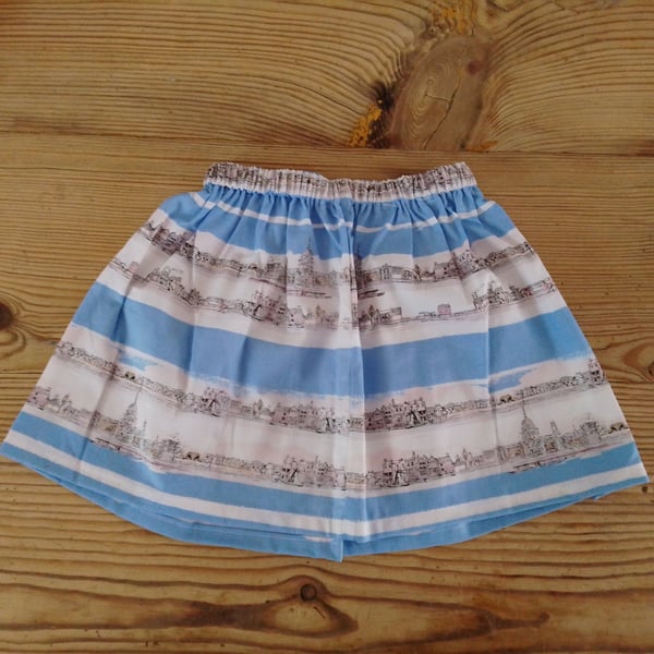 Baby or toddler skirt in a blue stripe cityscape pattern 12-18 months.