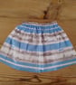 Baby or toddler skirt in a blue stripe cityscape pattern 12-18 months.