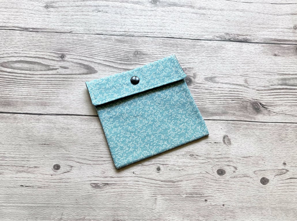Discreet cotton fabric sanitary pouch. Ditsy duck egg blue.