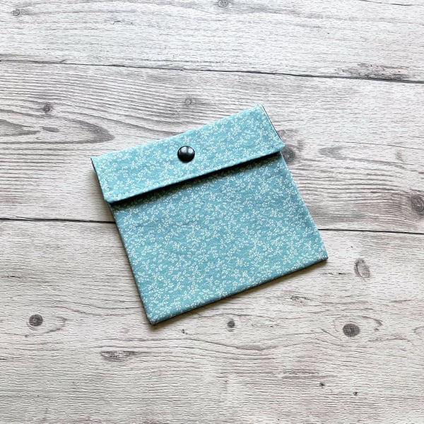 Discreet cotton fabric sanitary pouch. Ditsy duck egg blue.
