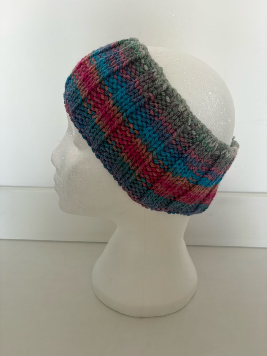 Hand knitted headband. 