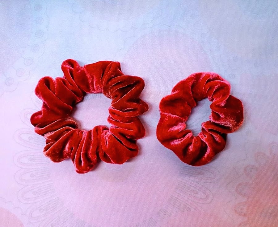 Two exotic spicy red silk velvet scrunchies.
