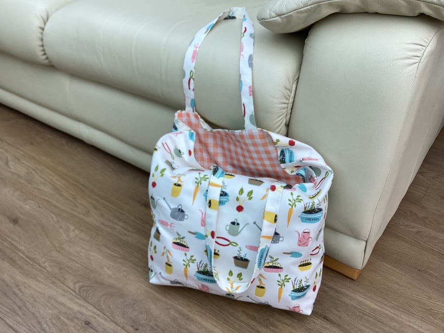tote bag, handmade in fabric patterned with herbs and gardening tools, fully lin