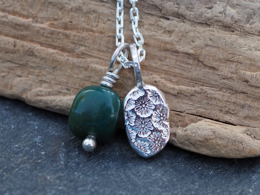 Pendant, recycled silver daisy pebble and green moss agate nugget.