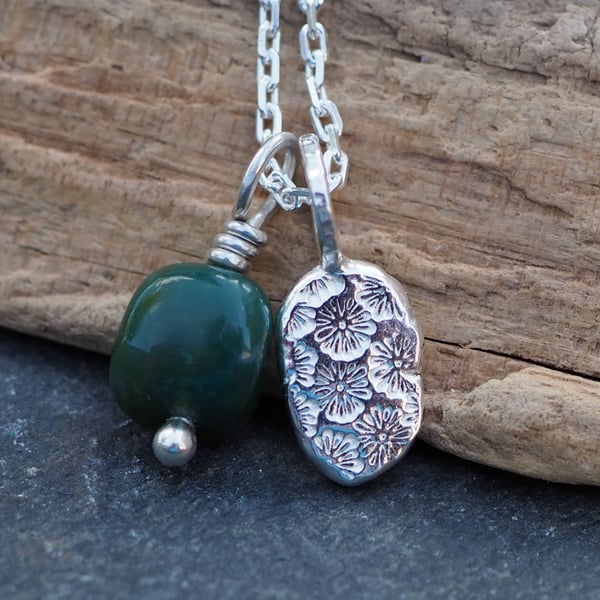 Pendant, recycled silver daisy pebble and green moss agate nugget.