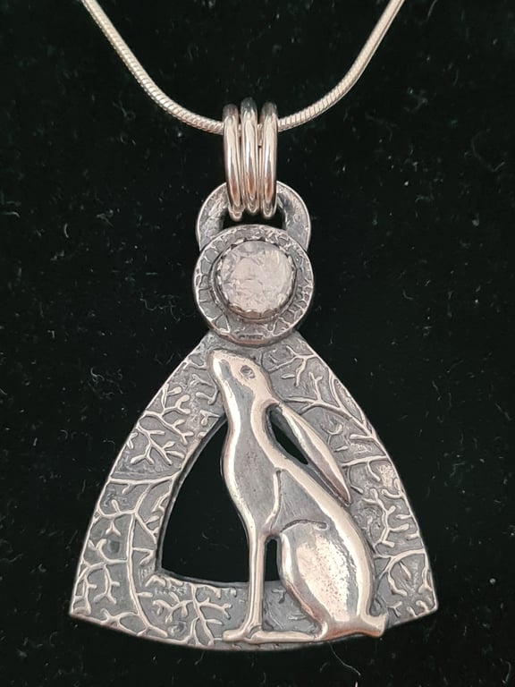 Fine silver moon gazing hare pendant