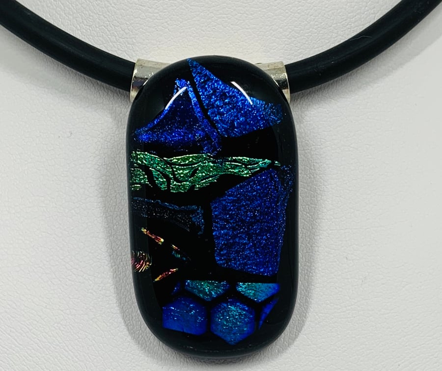 Striking Multicoloured fused dichroic glass pendant with Black necklace.