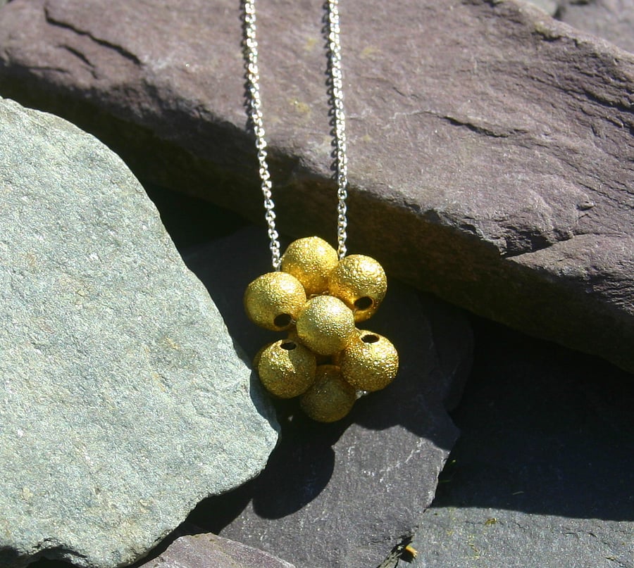 Glittering gold beaded cluster necklace