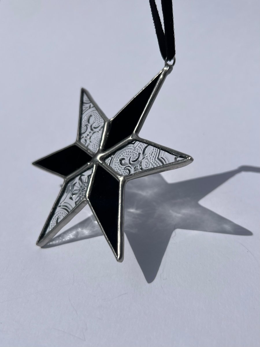 Black and clear patterned stained glass star decoration 