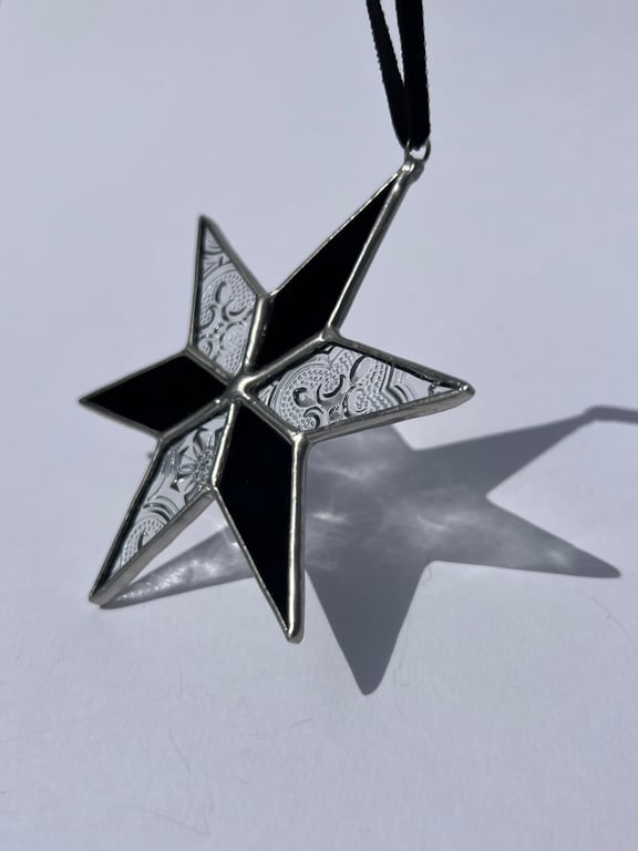 Black and clear patterned stained glass star decoration 