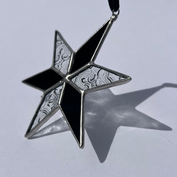 Black and clear patterned stained glass star decoration 