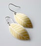Yellow leaf oval earrings