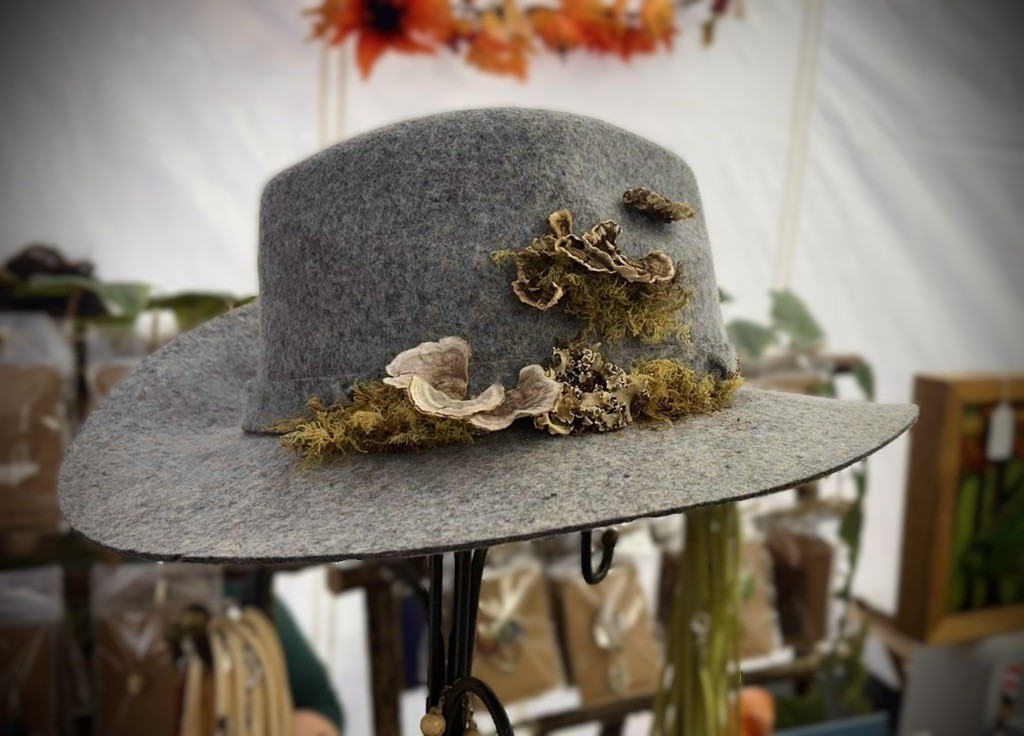 A 'Forest Walk' hat - 100% wool with stitched real lichen, moss, and mushrooms