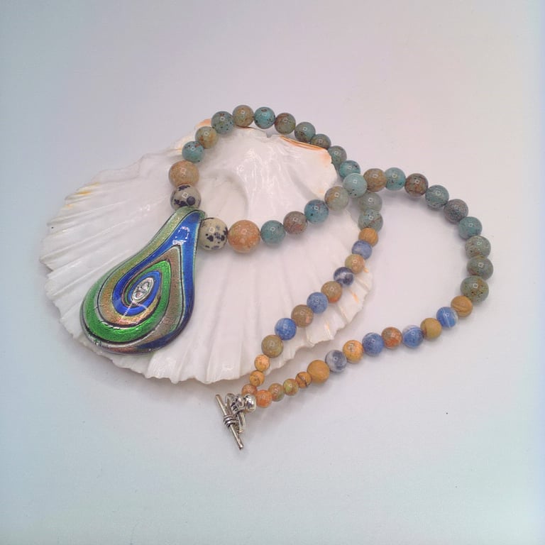 Glass Pendant with Blue Green and Gold Swirls on a Mixed Gemstone Necklace