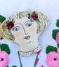 Lady face brooches 