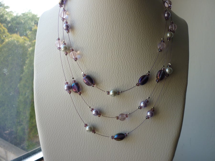 PURPLE, PINK, LILAC AND GREY MULTI STRAND NECKLACE.  798
