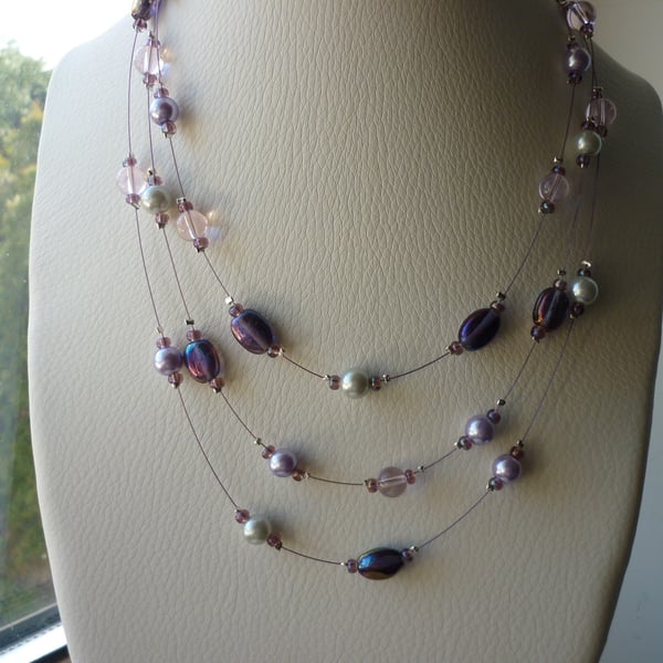 PURPLE, PINK, LILAC AND GREY MULTI STRAND NECKLACE.  798