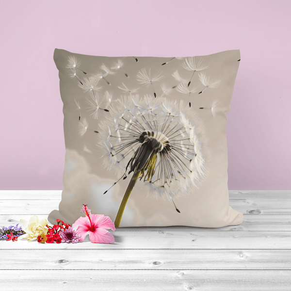 Cushion with a dandelion caught in the wind, the perfect art peice.