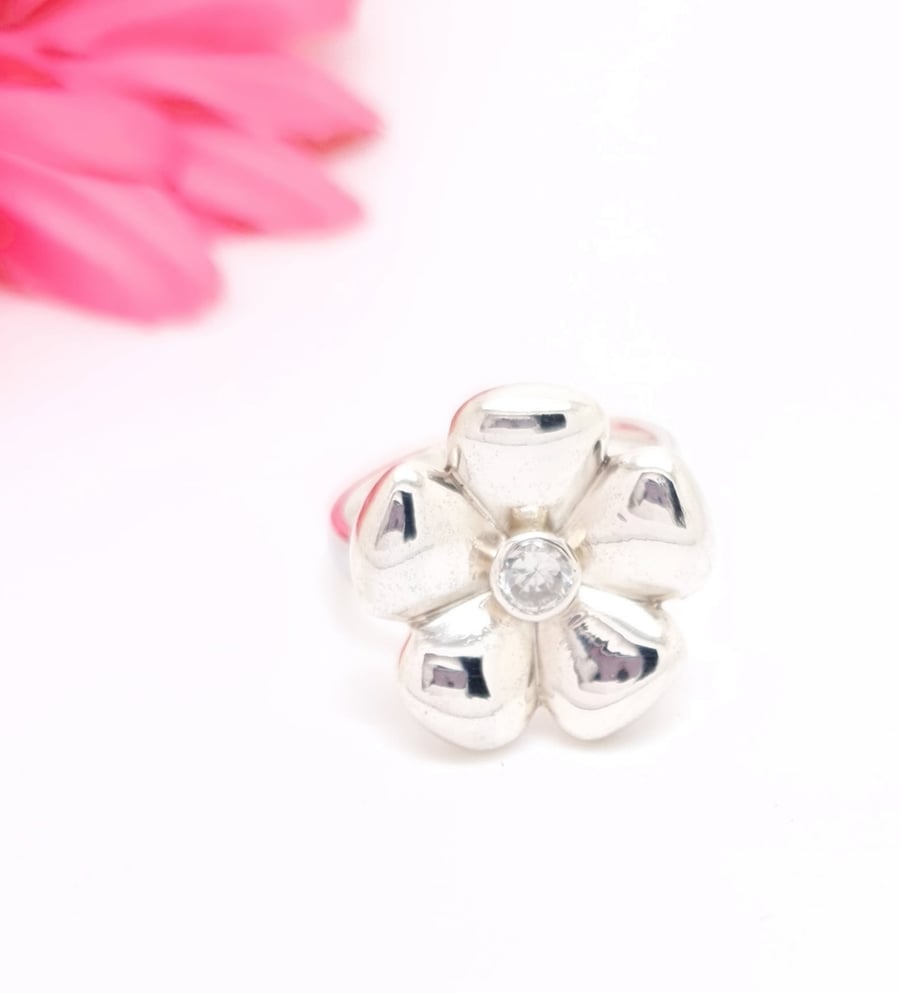 Sterling silver and cubic zirconia spinning flower ring, size O