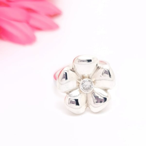 Sterling silver and cubic zirconia spinning flower ring, size O