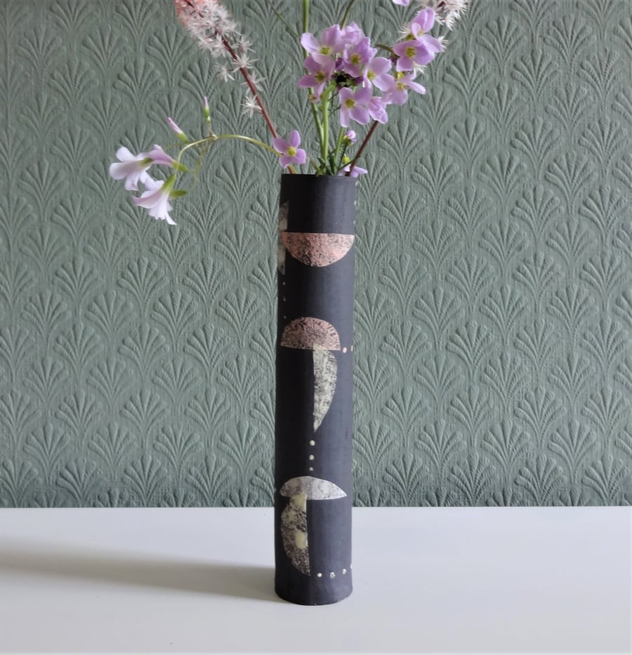 Slim, quirky, ceramic vase with mid century modern motifs. Stylish, modern look.