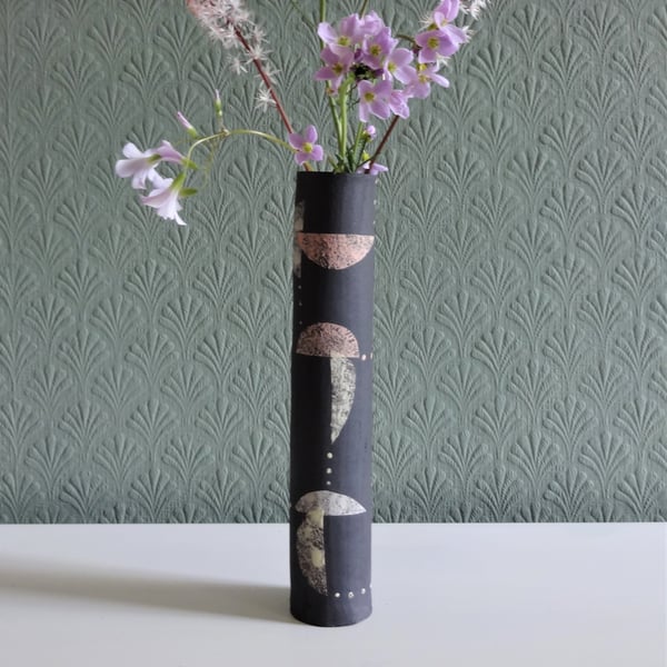 Slim, quirky, ceramic vase with mid century modern motifs. Stylish, modern look.