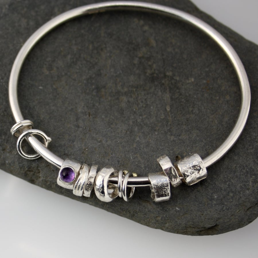  Silver amethyst and 18ct gold bangle