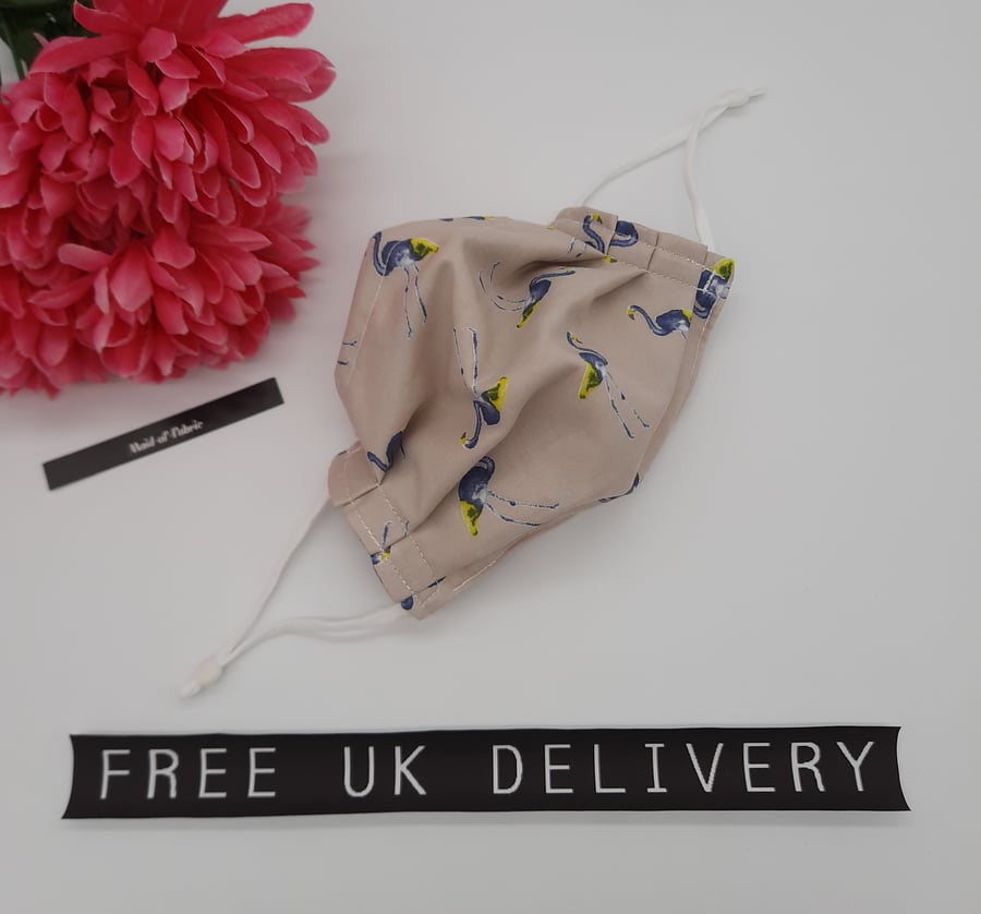 Face mask, small, adjustable,  3 layer,  nose wire, washable in blue flamingo 