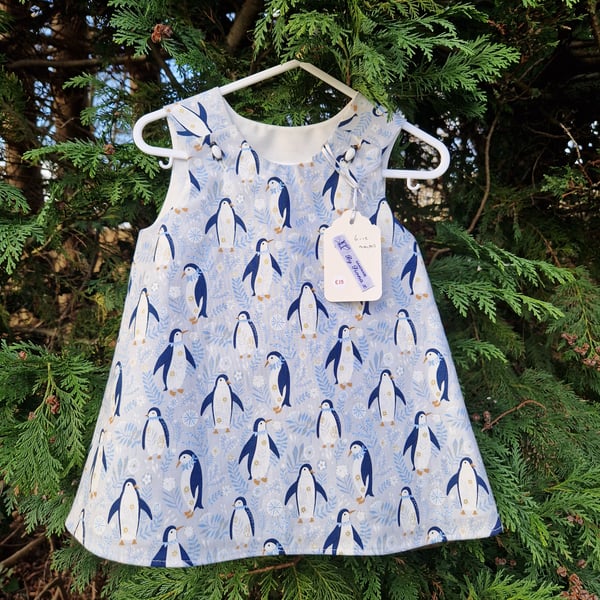 Age: 6-12m. Blue Penguin Cotton dress. 