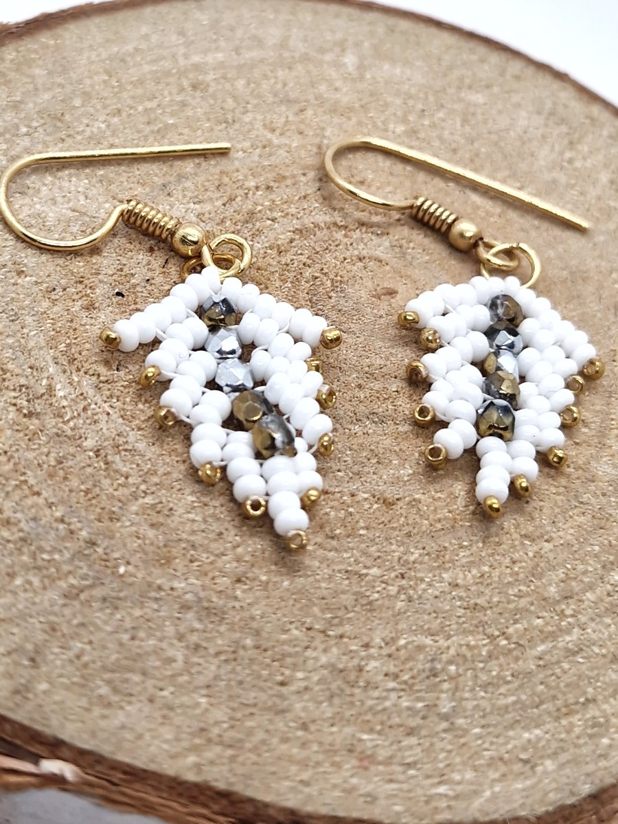 White and gold angel feather dangle beaded earrings