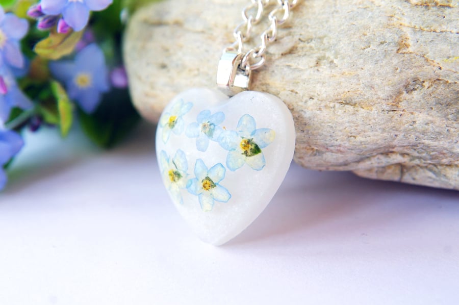 heart resin necklace with real forget me not flowers