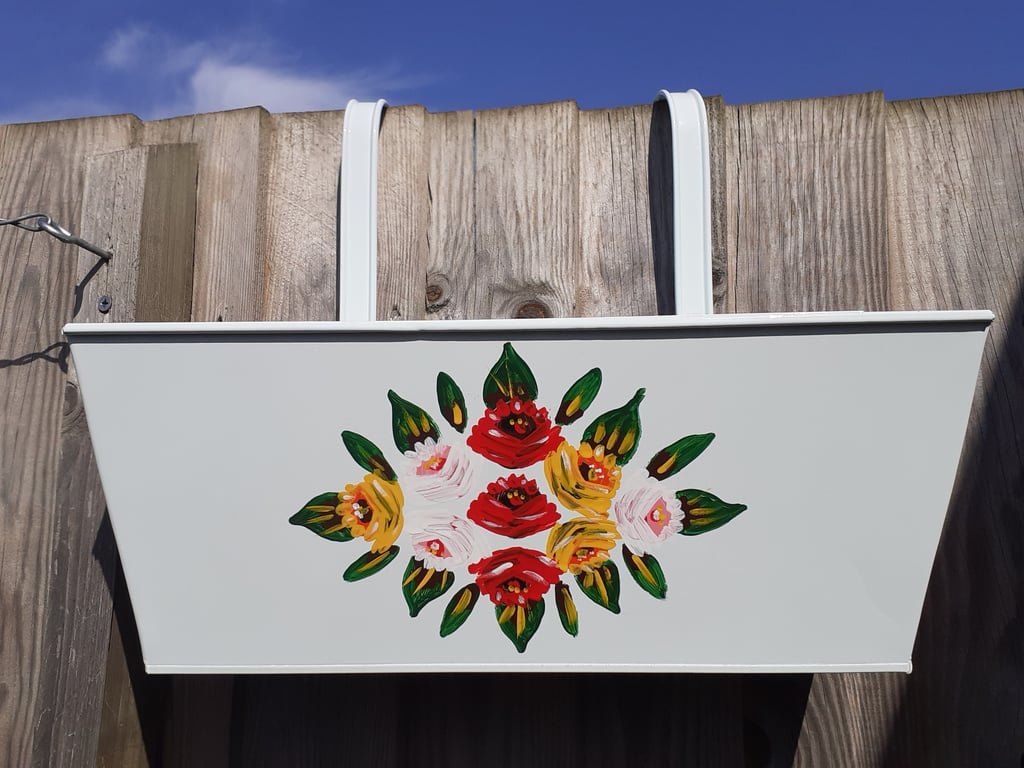 Rectangular hanging planter hand painted with canal art style roses.