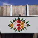 Rectangular hanging planter hand painted with canal art style roses.